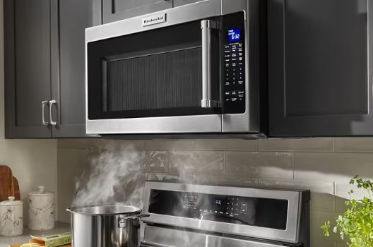 Why does my KitchenAid microwave display a 'door error' when the door is closed