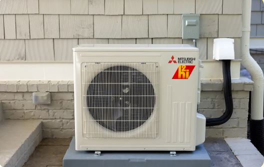 How do I reset my Mitsubishi air conditioner without a remote