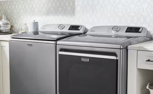 Why does my Maytag washer drain completely but leave clothes soaking wet